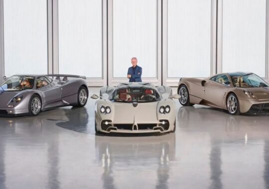 Horacio Pagani Stands Next To A Pagani Huayra Hypercar At His Italian Factory